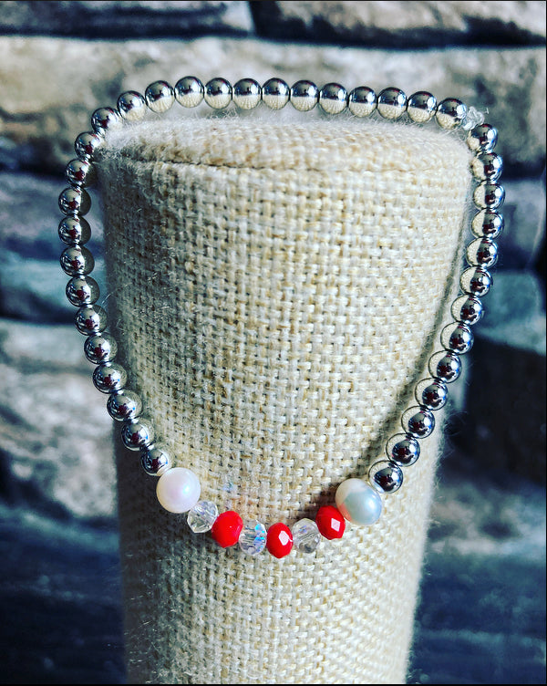 Christmas bracelet- hematite & mother of pearl red